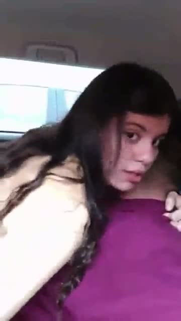 A sexy college girl enjoys hardcore sex in the back seat of a car
